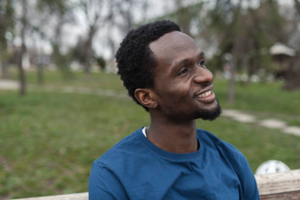 istock African American young man relaxing in the park 1378865014