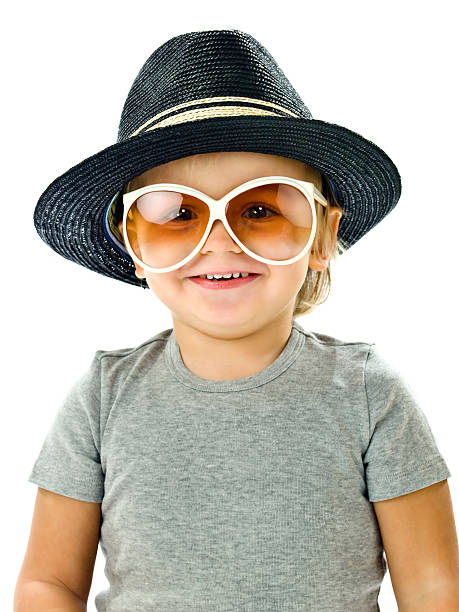 istock Funny boy smiling with a hat and glasses 137887191