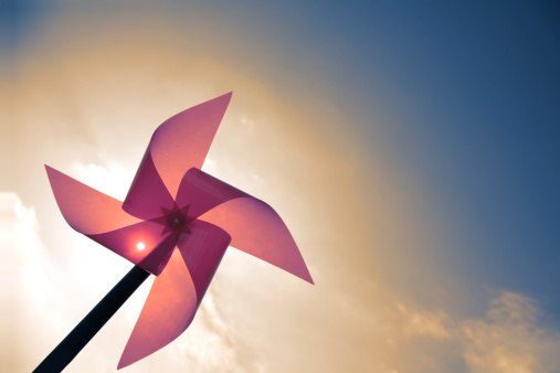 Pinwheel against the sun with great colors and space for text.