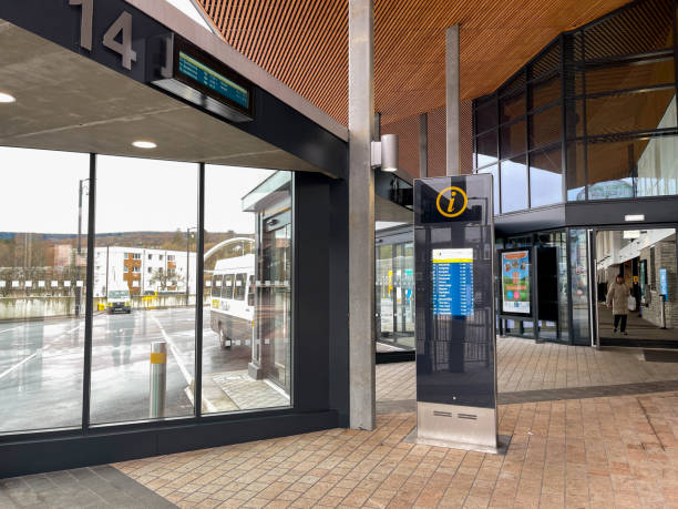 Interior of the new bus station in Merthyr Tydfil town centre Merthyr Tydfil, Wales - February 2022: Interior of the new bus station in the town centre, with electronic departures display screen. merthyr tydfil stock pictures, royalty-free photos & images