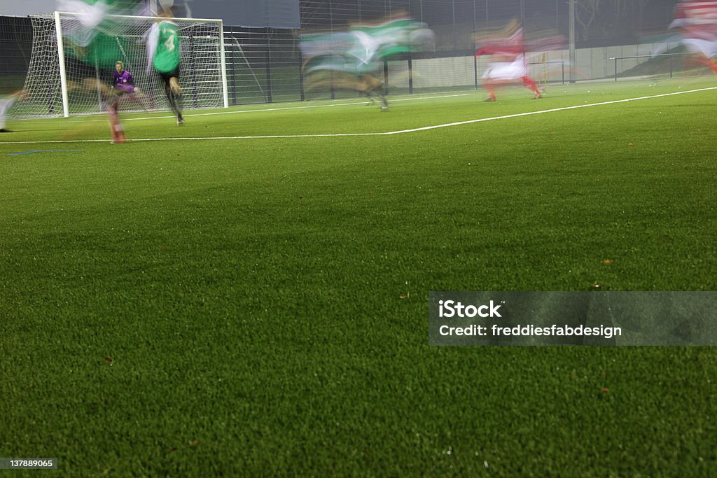 soccer field action on a soccer field on a foggy evening, long exposure, goalie alert Activity Stock Photo