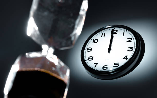 istock The Wall Clock and the hourglass both 1378907369