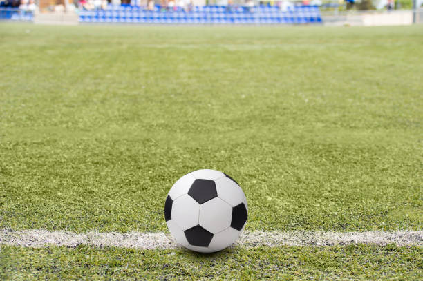 istock soccer ball at the stadium 1378937472