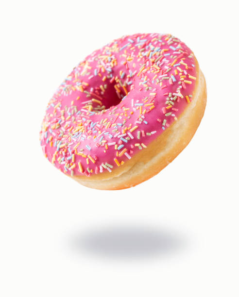 Freshly baked donut Freshly baked donut on white background doughnut stock pictures, royalty-free photos & images