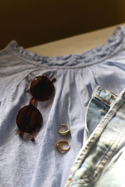 istock Blouse, Jeans, Sunglasses and Rings 1378987099