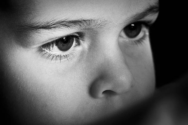 istock Young boy focuses intently 137899338