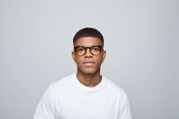 istock Headshot of handsome young man 1378993980