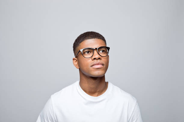 istock Headshot of thoughtful young man 1378995583