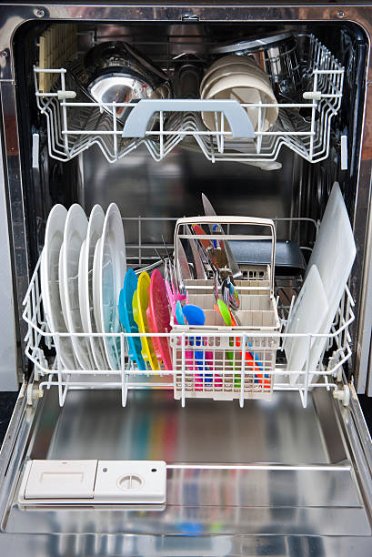 istock Packed dishwasher of clean dishes 137899588