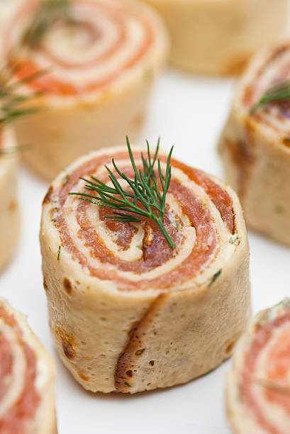 Smoked salmon roulade canape stock photo