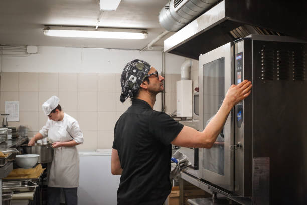 istock Master chef and cooks preparing food in a restaurant 1378998271