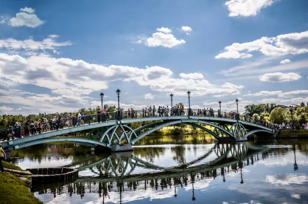 Bridge Full Of People Over Lake in Tsaritsyno Park In Moscow, Russia