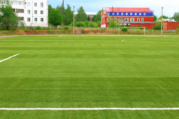 istock School stadium. Artificial football field. Background. 1379012576