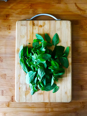 fresh mint leaves on cutting board