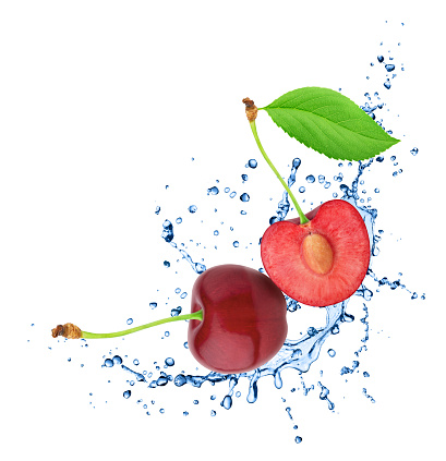 Whole and halved cherry in water splashes isolated on white background. Composite image for package design.