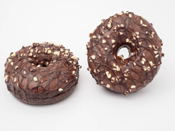 istock Fresh chocolate donut on a white background. Chocolate donut 1379063997