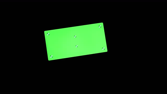 Silhouette of a Black Hand Touches a Smart Phone with a Green Screen in a Dark