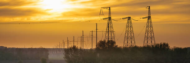 Panorama wide of High voltage power line on industrial electricity line tower stock photo