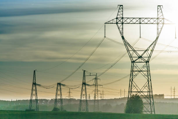 istock Industrial high voltage electricity line tower 1379104464