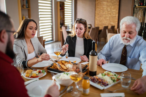 istock group of business people having fun on a lunch 1379109460
