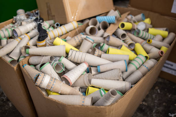 istock Bunch of thread mounts at the cardboard box, ready for recycling 1379110608
