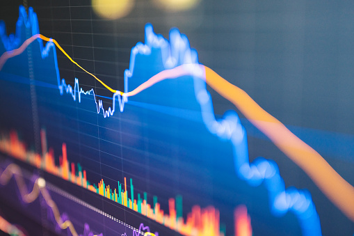 Different cryptocarrencies stockmarket and oil price exchange to dollar rate Statistics comparison on monitor display.