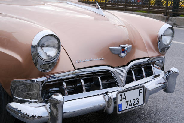 Istanbul, Turkey - February 26, 2022 : A vintage but in good condition Studebaker, which is an American Classic Car was parked on The Galata Bridge in Istanbul.