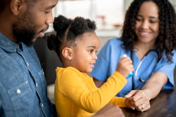 istock Homecare Visit with a Family 1379141795