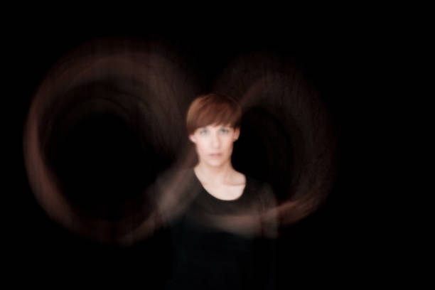 istock Abstract young woman portrait with long exposure infinity symbol 1379146820