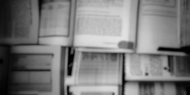 Opened blank pages of magazine or book, catalog on Stack of thick magazines isolated on a white background - a mock up for demonstrating your design