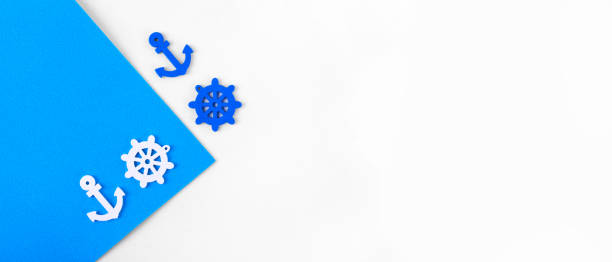 Blue envelope with anchor, boat, steering wheel inside on a blue background. Template for newsletters and other mail designs on nautical theme.