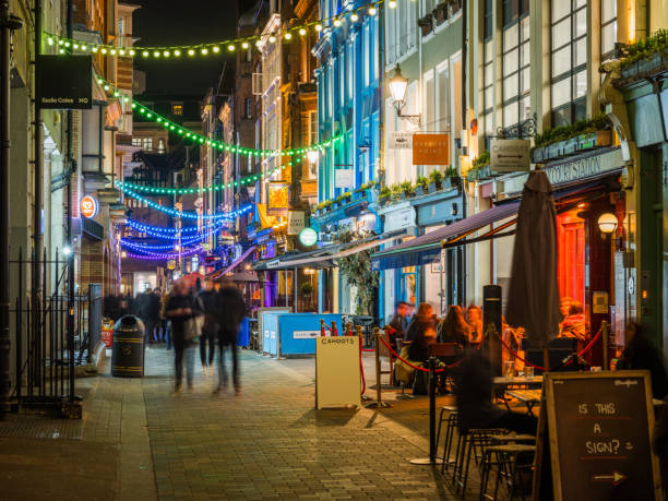 London nightlife crowds of people Soho bars restaurants at night stock photo