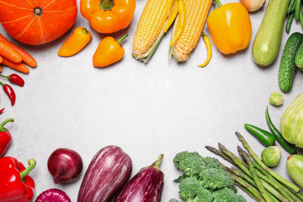 istock Frame of different fresh vegetables on grey table, flat lay. Space for text 1379192058