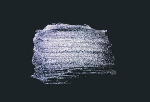 istock Abstract blue hand-painted stains on black background 1379194778