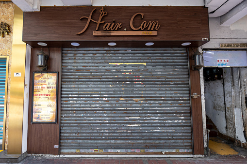 Hong Kong - March 4, 2022 : A hair salon closed due to COVID-19 restrictions in Hong Kong. Venues including gyms, hair salons, bars, and entertainment venues will remain closed until April 20.