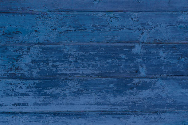 istock Old wooden painted dark blue boards. Horizontal view. Background. Texture. 1379210762