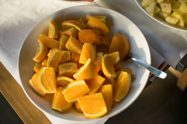 istock Sliced pieces of orange in a bowl 1379224468