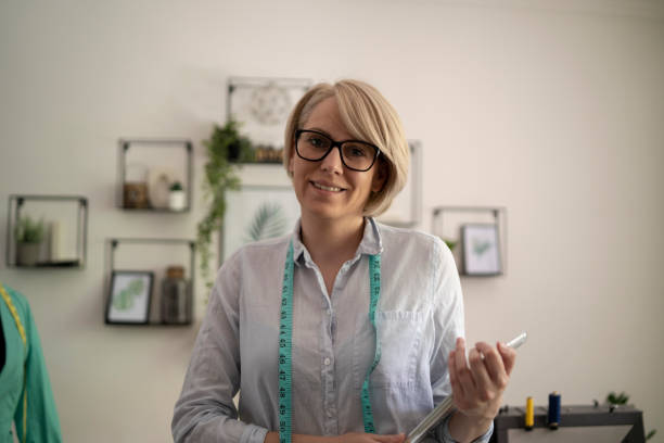 istock Young woman is sewing 1379227136