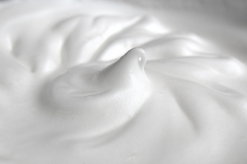 The texture of egg whites whipped into a large foam