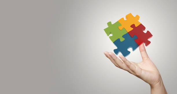 Hand showing 3d puzzle as concept stock photo