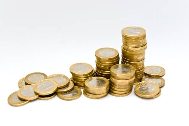 Rising chart of one Euro coins stock photo