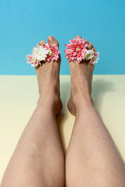 istock Flowers between woman's toes 1379251039