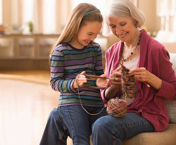 Grandmother with granddaughter getting ready to knit  knitting needle photos stock pictures, royalty-free photos & images