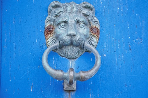 Lions head door knocker. Knocker lion's head. Traditional Door Knocker in the shape of a lions head