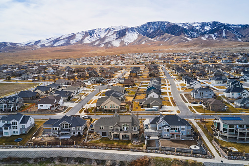 An aerial view of a housing development that sits next to Utah Lake, in Utah County Utah USA.