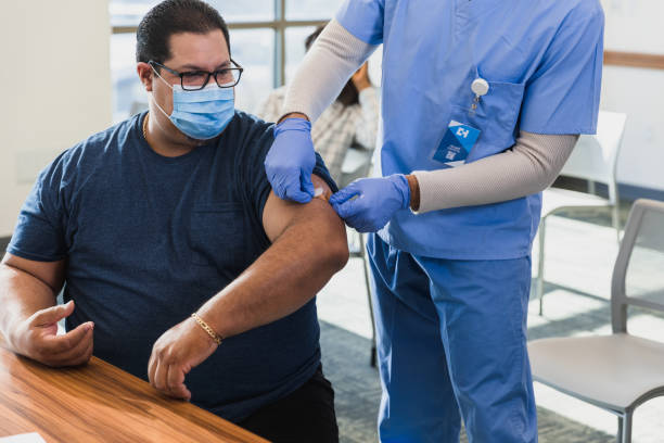 istock Nurse applies bandage 1379306251