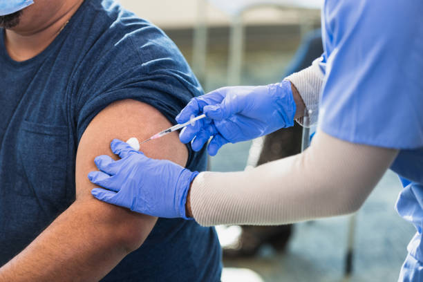 istock Patient receives injection 1379313211