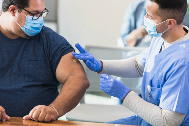 istock Doctor applies bandage 1379313216