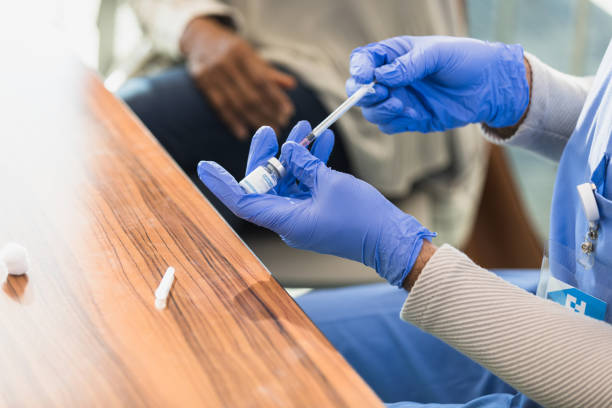 istock Doctor prepares syringe 1379313226