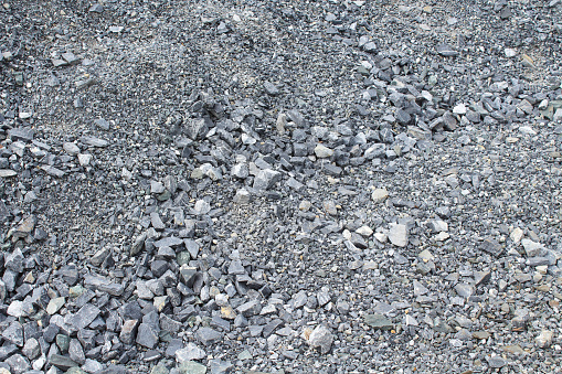 Granite crushed stone. Close-up. Top view. Background. Texture.